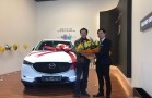 NSND Trung Anh về nhà đi con mua xe Mazda CX5