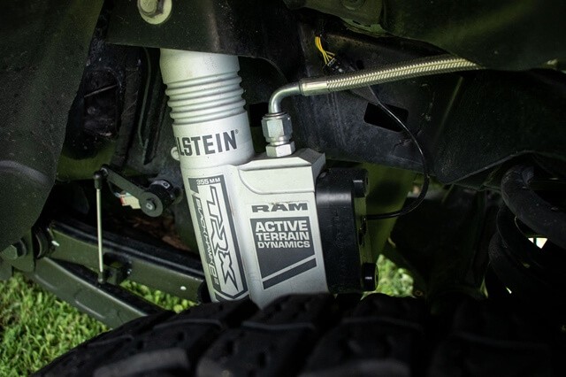 giam-chan-xe-ram-1500-trx